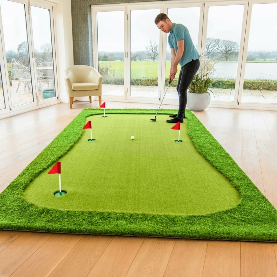 Indoor golf putting mat in a small living space